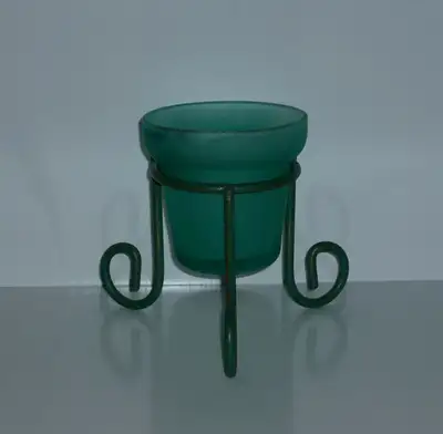 ... Use indoors or outdoors ... As shown in pictures green Glass Candle Holder the stand is heavy ga...