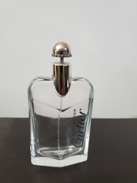 Empty Cartier perfume bottle.