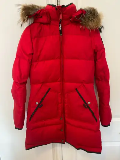 In great used condition. Beautiful, red winter jacket by Pajar. Extremely warm, comfortable and well...