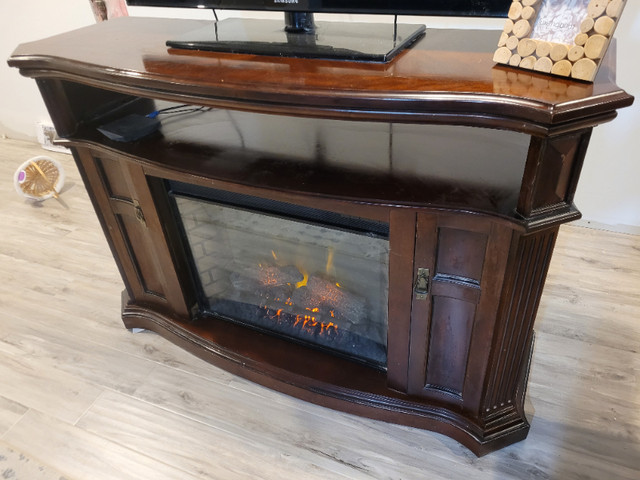 Solid wood fireplace in TV Tables & Entertainment Units in Saint John