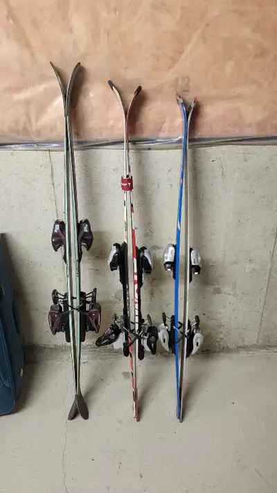 Rossignol 135cm Atomic 129.5cm Head 126cm Will take best reasonable offers. $100 for the 3 sets