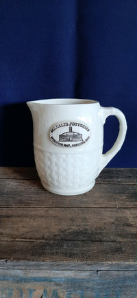 Medalta Pottery basket pitcher (replica)