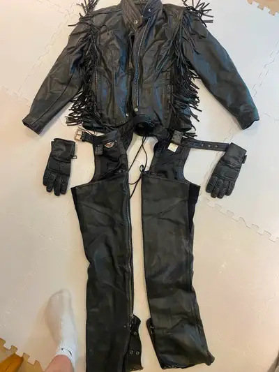 Leather jacket (xs), chaps (s) great comes with pair of gloves. Excellent condition small amount of...