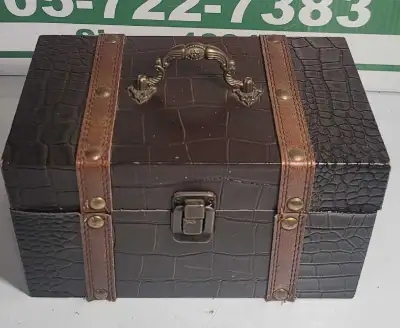 In good condition, measures 9x5.5x5 inches