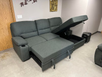 NEW IN BOX Multi Padded Sectional- Pullout, Cupholders & Storage