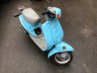 1987 Yamaha Razz baby blue scooter