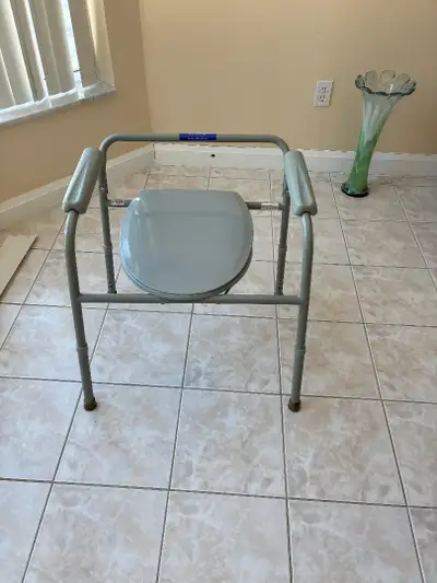 Used but in great condition. Over the Toilet Commode Chair with back & arm rests asking $ 50 or best...