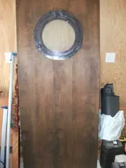 Wood Door. Has porthole on both sides. Did not work for our project. Measures 1 3/4 x 34 x 80 (appro...