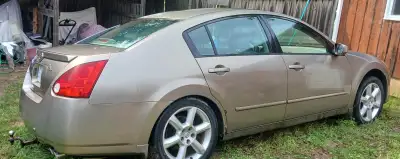2004 Nissan, 3.5-liter v6 - 6 speed manual. needs exhaust work / fan relay. new parts, 2 new front t...