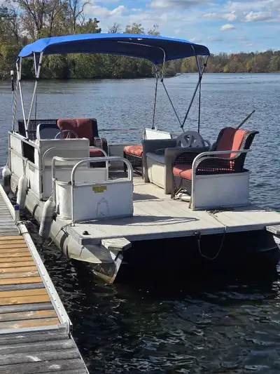 20 ft Pontoon Boat with 40 hp Johnston motor and trailer. Runs well.