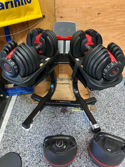 - Selling used Bowflex dumbbells with stand included - They have an adjustable weight from 5 lb. to...