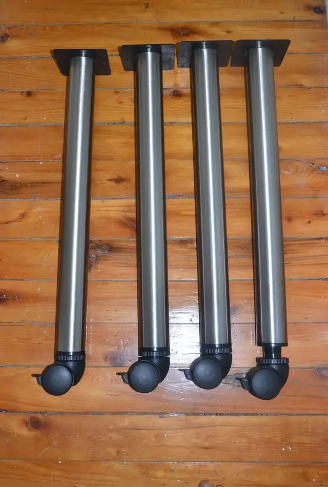 4 Haffel Stainless Steel Table Legs with wheels (EACH COST $100)