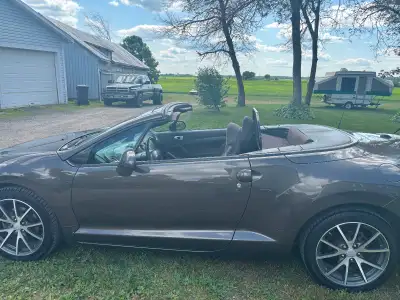 I am selling my 2012 Mitsubishi Eclipse, a stylish and fun-to-drive convertible that is perfect for...