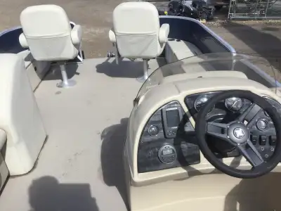 One owner, 27 hours on boat and motor, Suzuki 115 hp, Bimi/with cover, Pontoon cover, live well, ski...