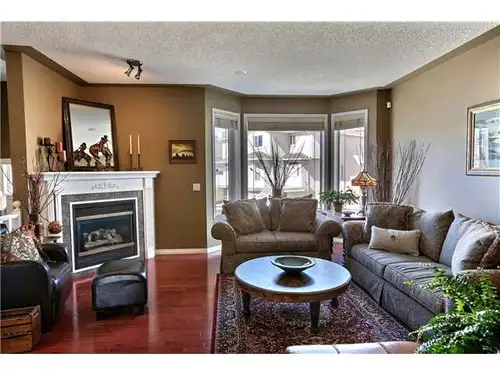 Beautiful executive town home backing onto Country Hills Golf Course with gorgeous views! This two s...