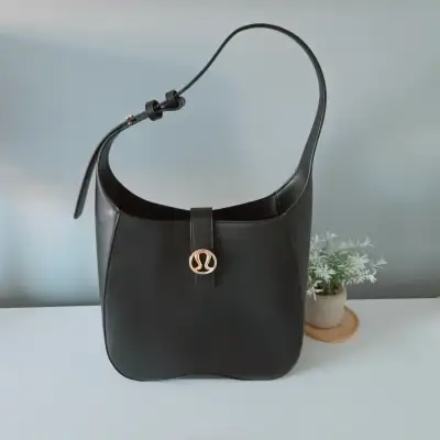 Lululemon Black & Gold 8-Litre Shoulder Bag - Pre-Loved! ✨, View more