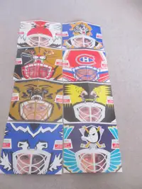 set of 8 goalie masks from kraft