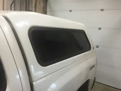 Leer fibreglass canopy, fits 2007.5-2013 Chevrolet and GMC with 5’8 box. Good condition except for a...
