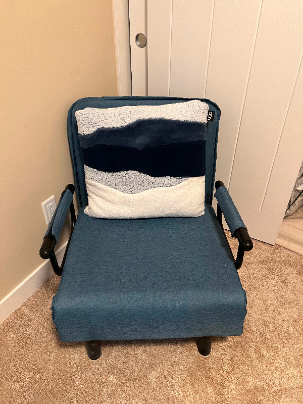 Chair unfolds into single bed in Chairs & Recliners in Edmonton