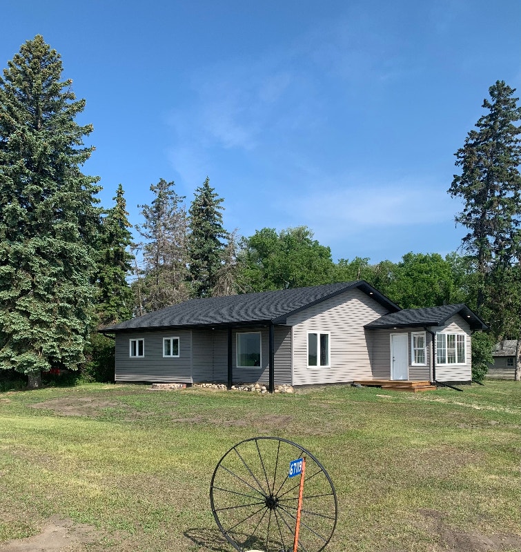 Acreage w/ updated home near Gladstone Houses for Sale Portage la