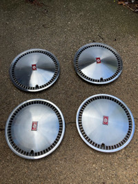 15” vintage oldsmobile metal wheel covers