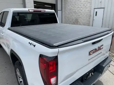 Good condition. Used for 2 years. GMC Accessories Soft Folding Truck Bed Cover for Short Bed. GM Par...