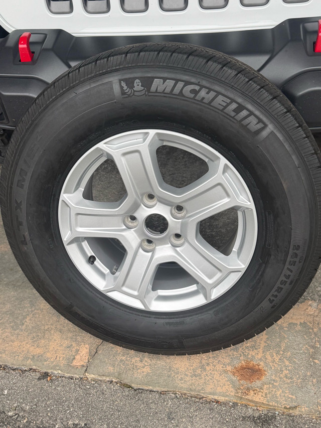 Jeep Wrangler factory Rim new tire in Tires & Rims in Ottawa