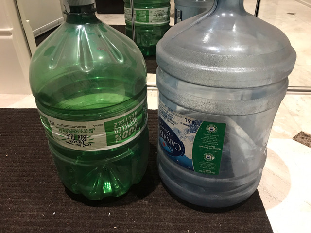 Blue filtered water containers in Other in Calgary