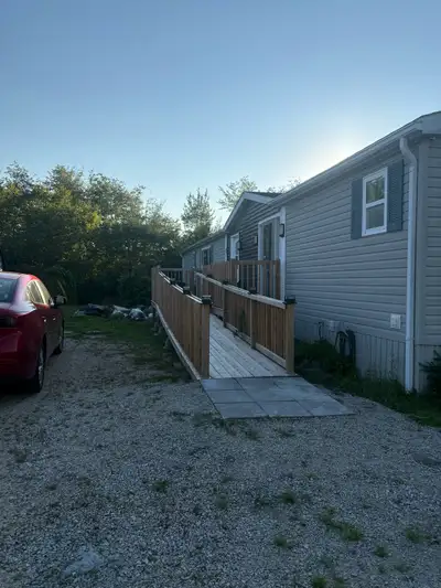 Nestled between Hubbards and Chester on Highway #3 this mini home is located in East River Nova Scot...
