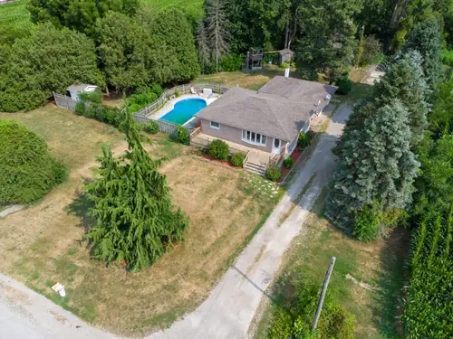Welcome to your dream country retreat — a beautiful brick raised ranch sitting on almost an acre jus...