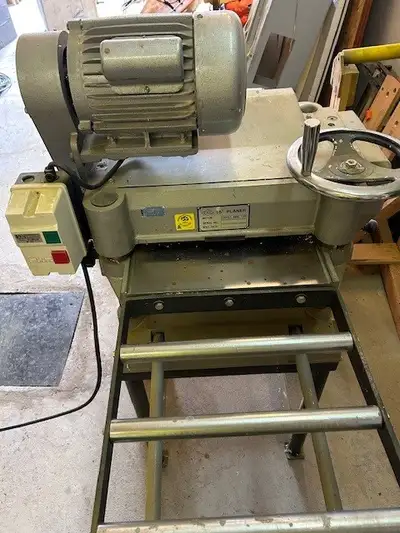 15" Thickness planer with stand. CII. New value over $3000. Asking $800.