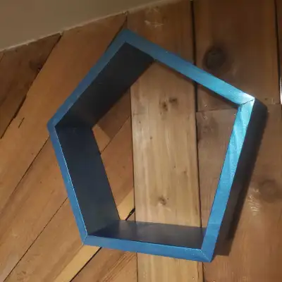 Pine pentagon shelf with metallic turquoise spray paint. H: 14.5" x W: 15" x D: 4" Made by Gonzo Fac...