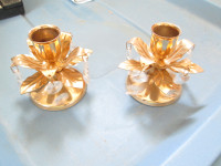 pair of brass candle holders with glass prisms
