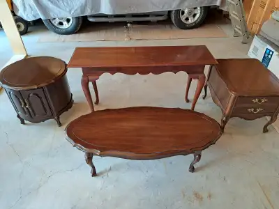 Selling a whole living room set that consists of 2 loveseats, a wing back chair, 1 coffee and 2 end...