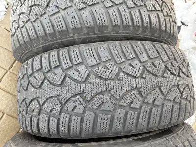 235/60 R 16s on 17 inch rims bolt spacing five bolts spacing 2 11/16 between holes in excellent cond...
