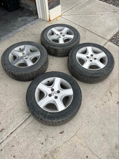 PRICE IS FIRM 4 original Honda civic 4x100 rims on Good year winter tires 195/65R15. Rims are in gre...