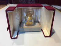 Superbe miniature de parfum L’air D’or dans son écrin.