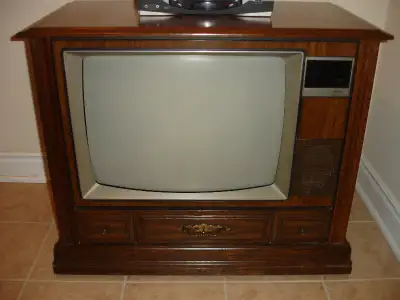 OLD VINTAGE 25" RCA XL-100 TV WOOD CONSOLE SELL IT $50.00 FIRM!, View more