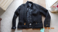 Lady black jacket,26in back length, zipper, buckle accenta brand