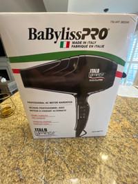 Brand new, never opened. Babyliss Pro 