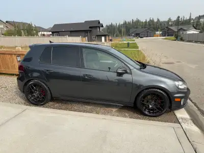 2012 VWGolf GTI 246,840 kms Extra floor mats Studded winter tires like new on car Comes with summers...