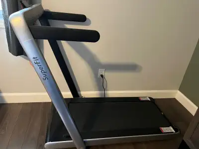Brand new treadmill Comes with remote and folds flat for easy storage