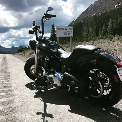 This is a used, 2013, Harley Davidson Softail Slim, Vance and Hines short shot pipes, 14” ape hanger...
