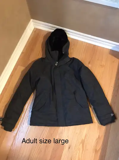Beautiful lightly used charcoal grey winter jacket from Aritzia size large Very soft fuzzy inner lin...