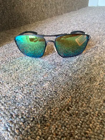 Brand new Revo sunglasses, models are called Ground Speed. These have green mirror polarized lens, b...