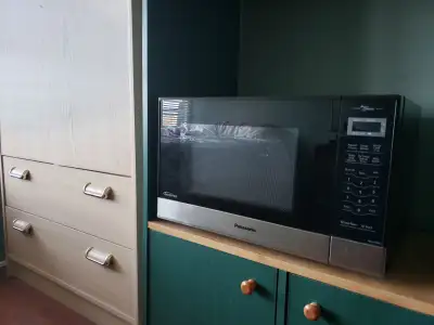 PANASONIC S-STEEL CLEAN MICROWAVE IN MINT COND., View more