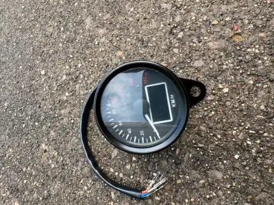 Still in box analog and digital speedometer for motorcycle