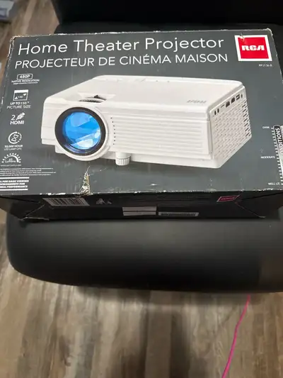 Bring the cinematic experience home with this RCA projector, boasting 480P native resolution and the...