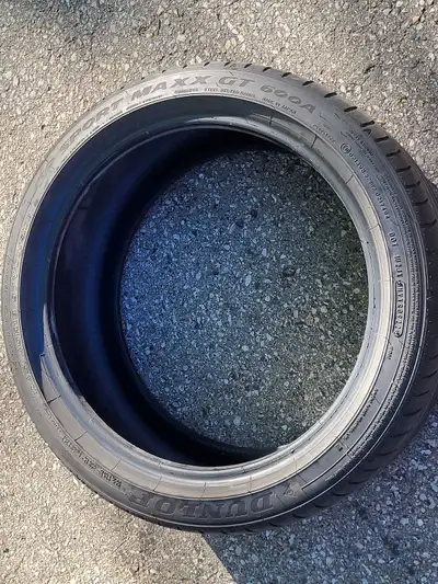 These Dunlop Sport Maxx GT 600 A performance tires, sized 245/40R18, are in good pre-owned condition...
