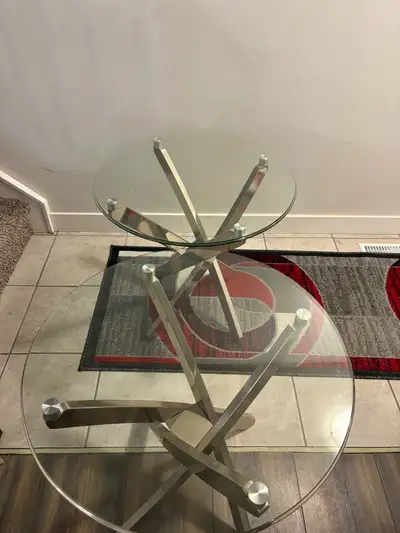 Glasstop Coffee Table and 2 side tables. Modern design with chrome legs. Excellent condition.